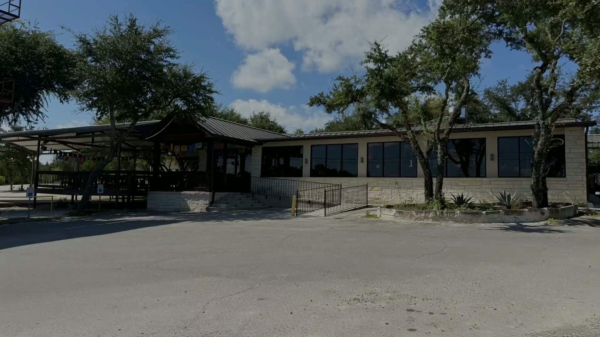El Jalisco #3 on Highway 46 — the limestone building under the live oaks, its covered patio to one side